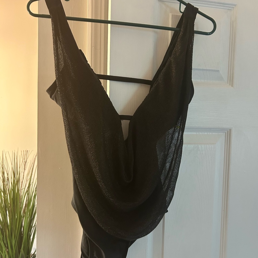 Elegant black LUXE med.  swim suit.  NWT